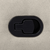 Close-up of beige fabric texture and stitching on armrest edge